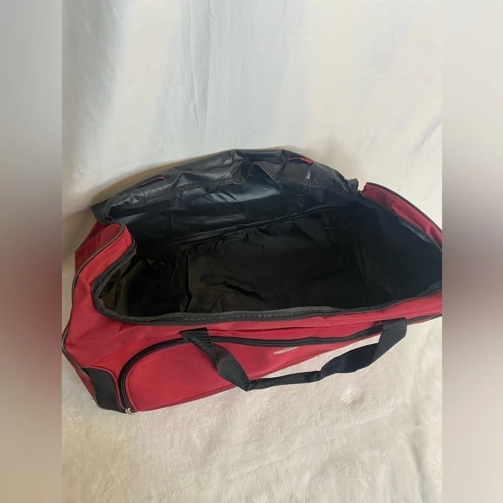 TAG red large duffel travel bag